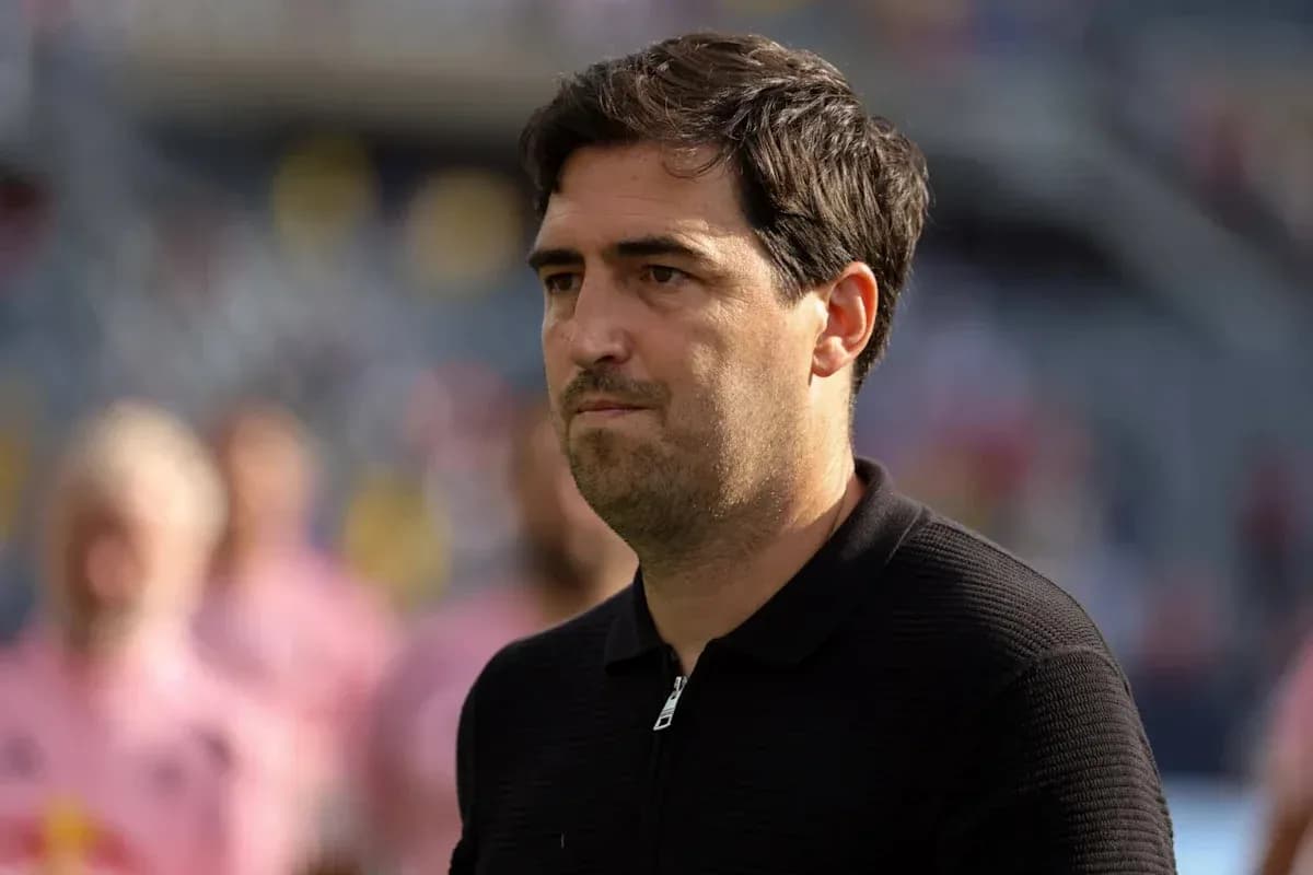 Coach observing the match from the sidelines
