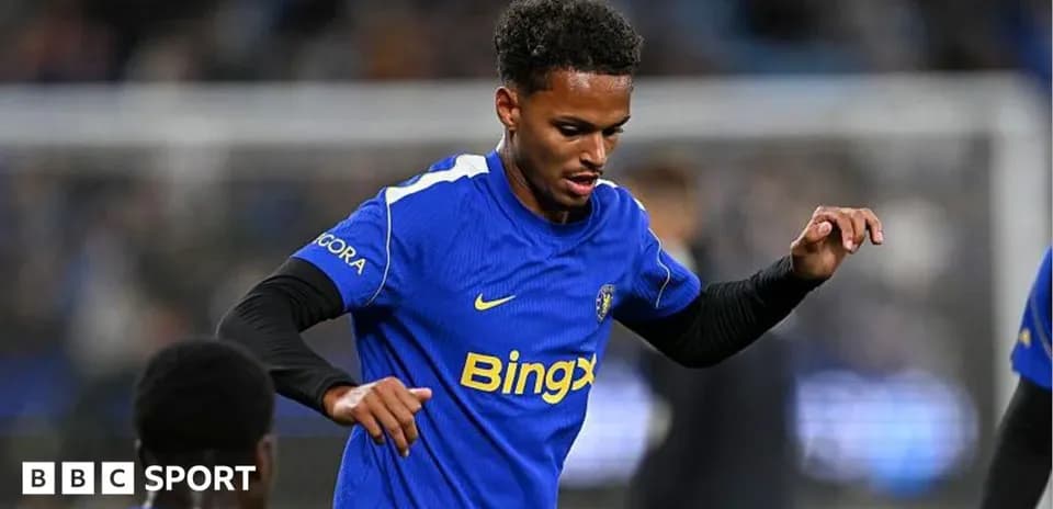 Player warming up in blue jersey before match