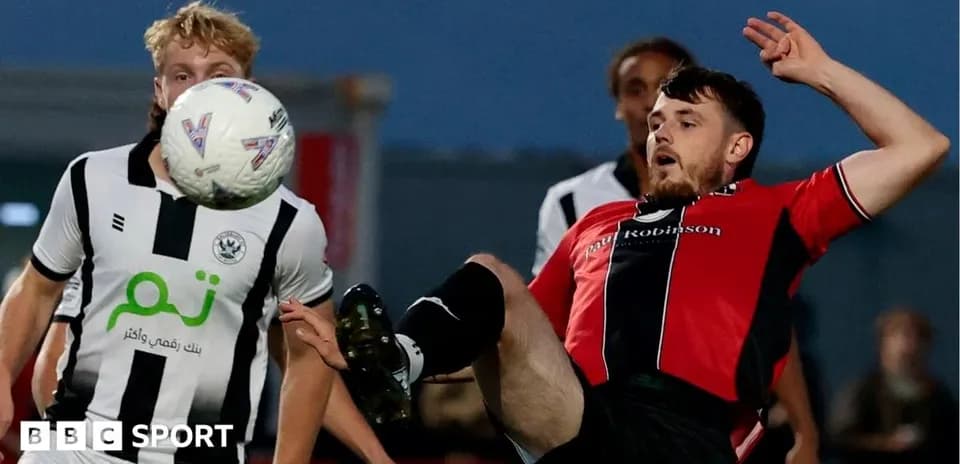Player attempting to control the ball during match