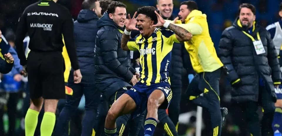 Fenerbahçe player celebrating on the sidelines