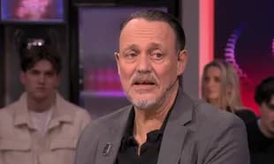 Man speaking during a talk show segment