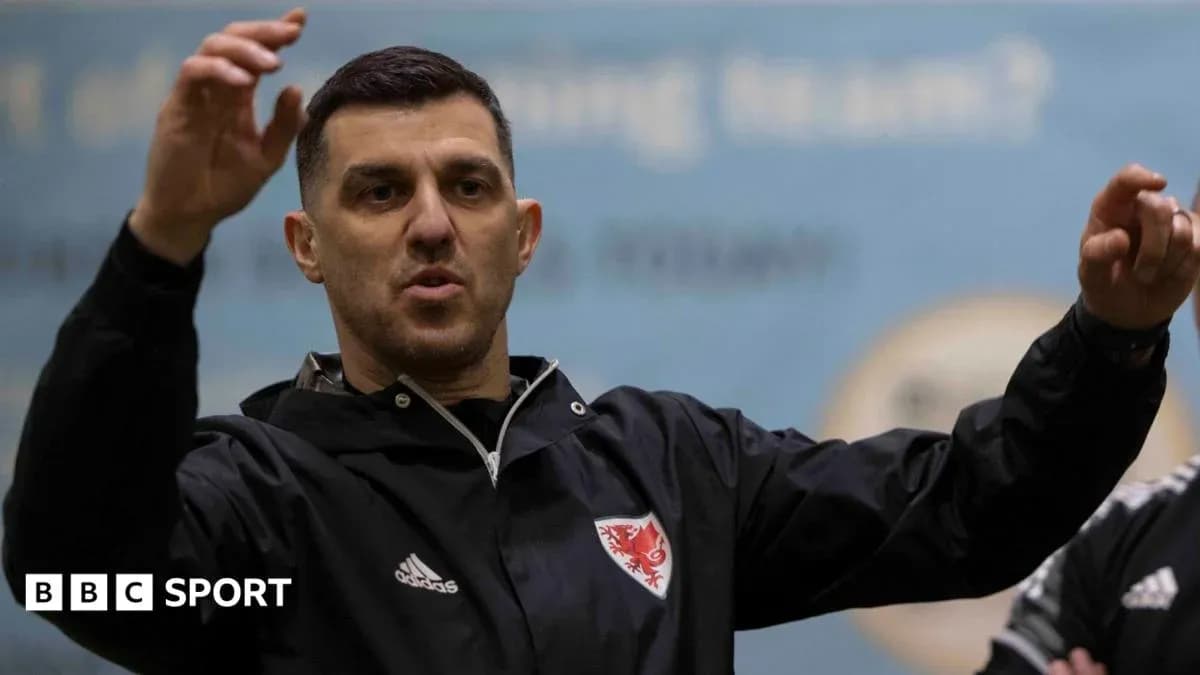 Coach giving instructions during training session