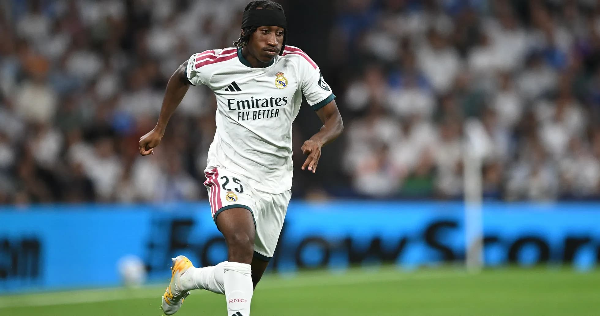Player sprinting during a match for Real Madrid