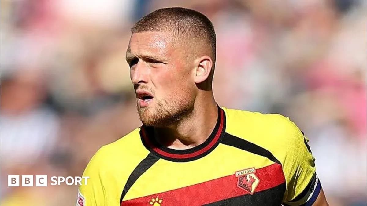 Player wearing Watford jersey during match