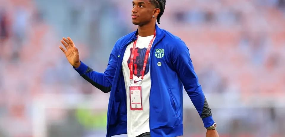 Player greeting fans before the match