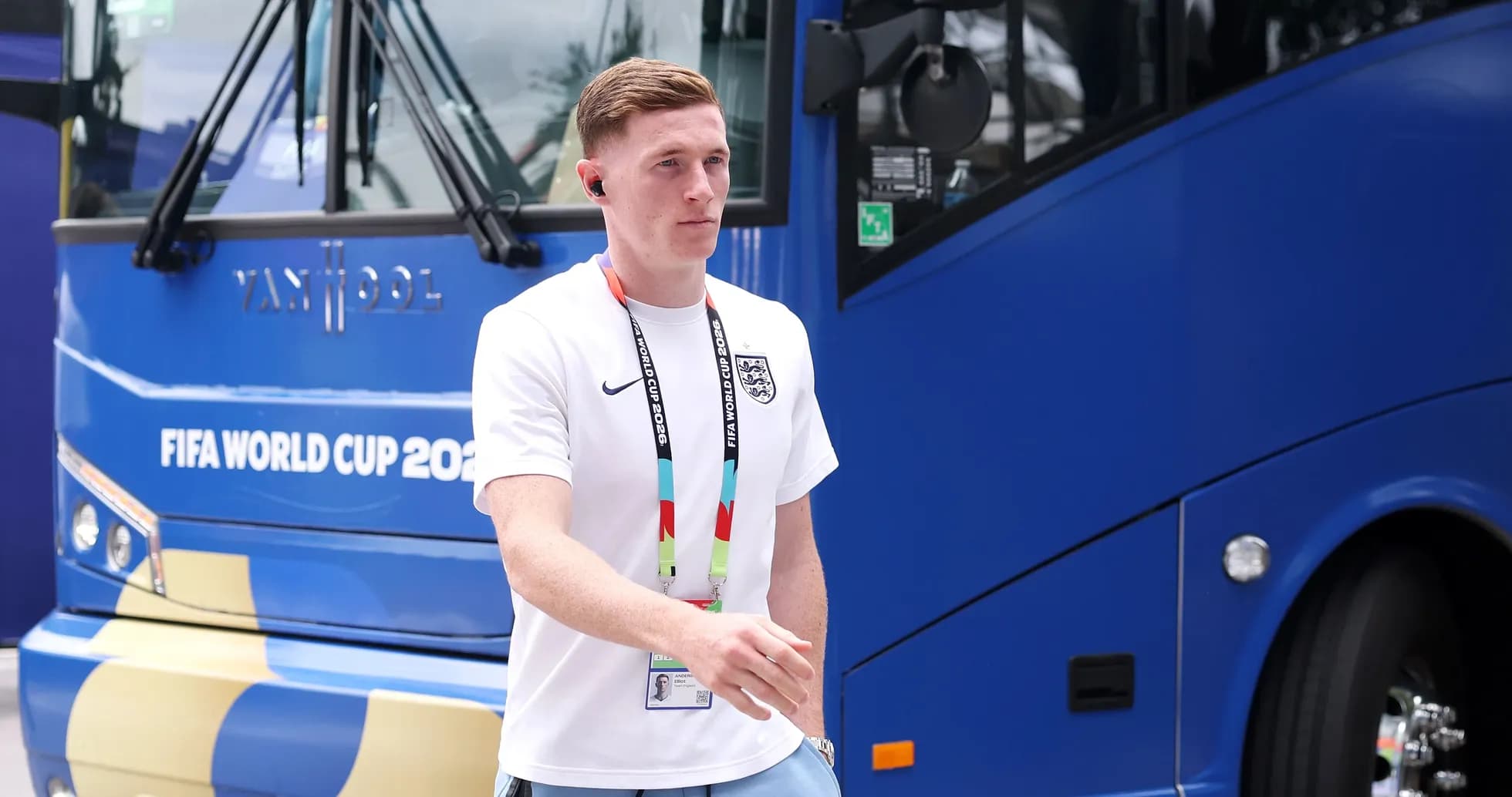 Player walking near FIFA World Cup team bus