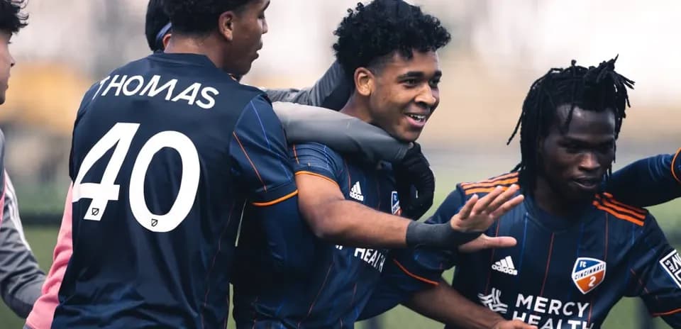 FC Cincinnati II players celebrating a goal