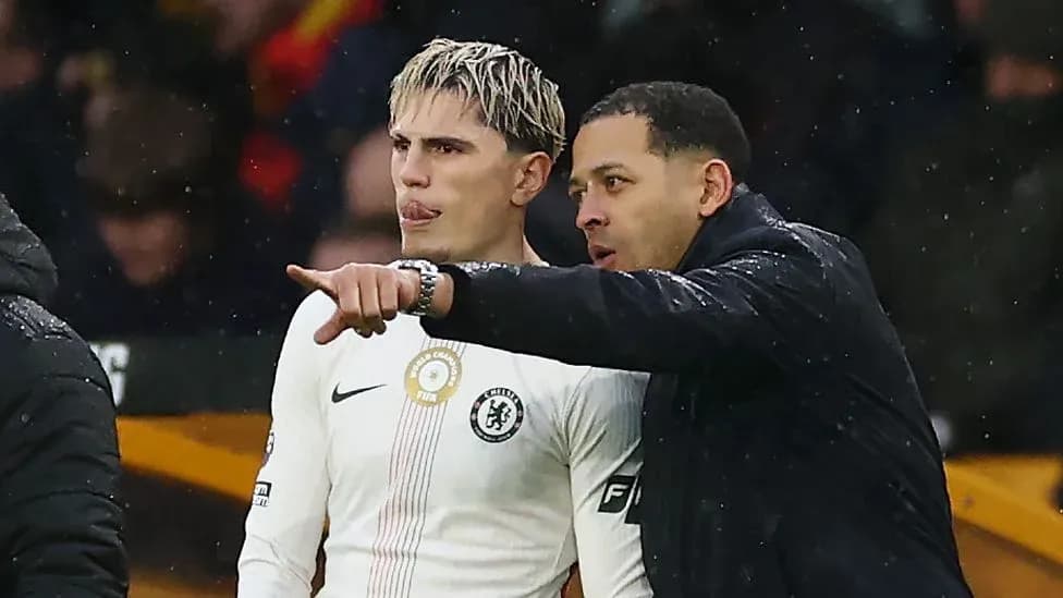 Player receiving instructions from coach during match