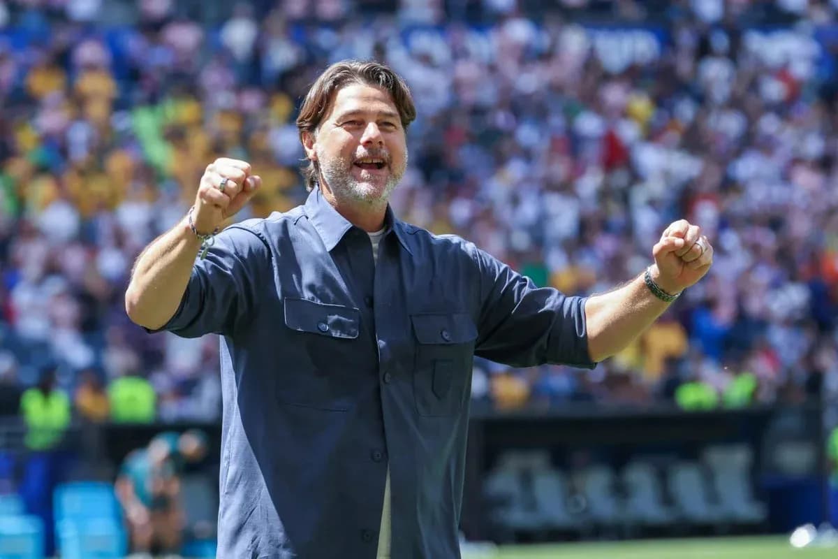Coach celebrating enthusiastically during match