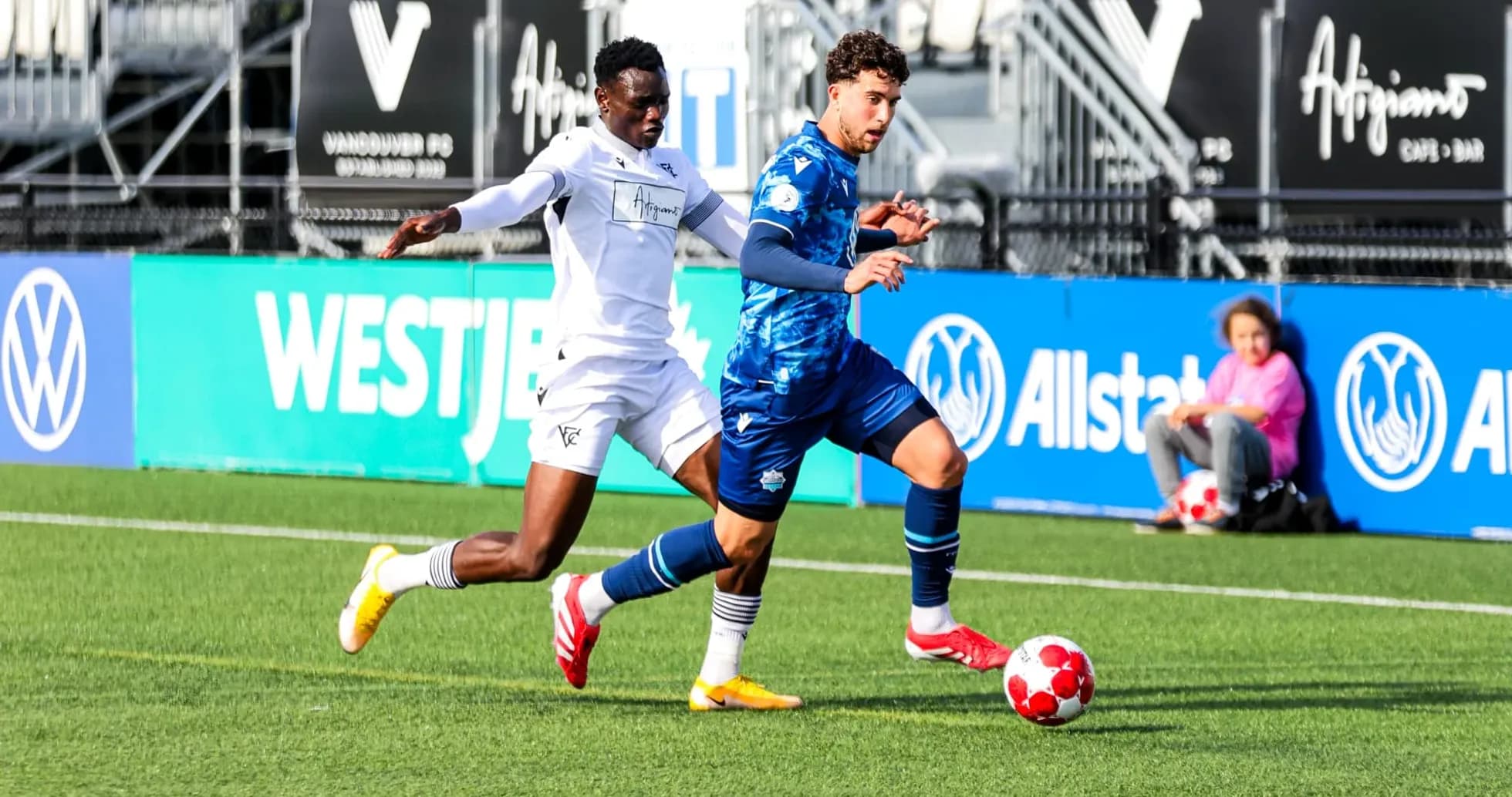 Vancouver FC player competing for the ball