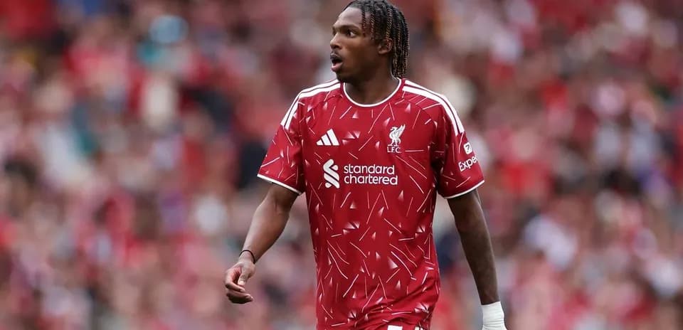 Player in red Liverpool kit during match