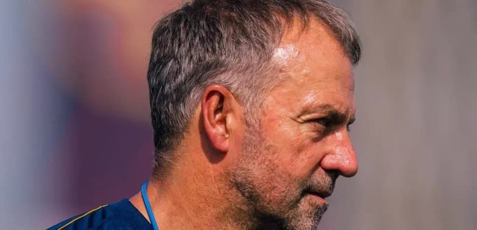 Coach observing during training session