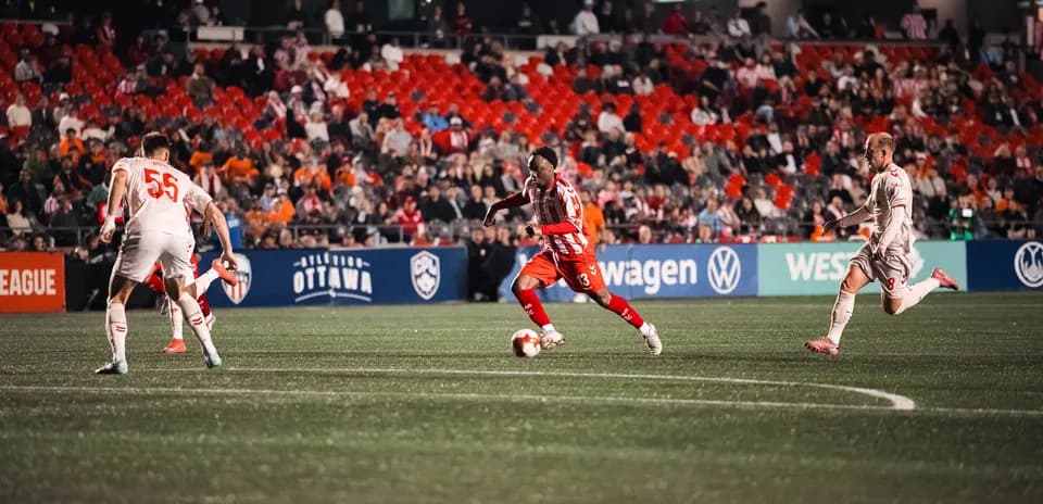 Player dribbling the ball during match