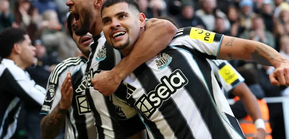 Newcastle players celebrating a goal