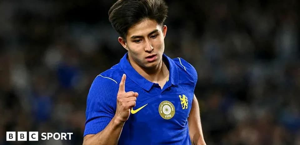 Player in blue jersey celebrating during match
