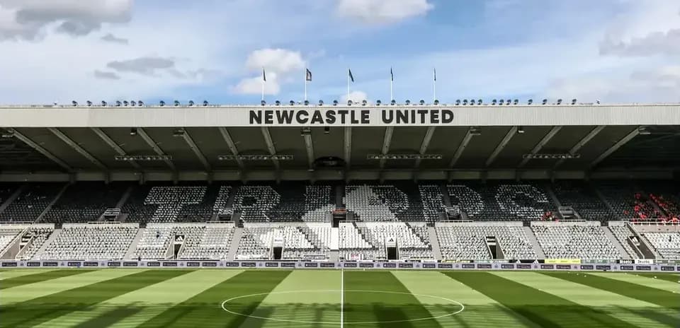 Newcastle United stadium with empty seats and pitch