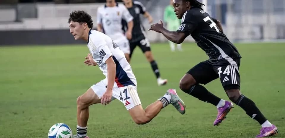 Player dribbling the ball during match action