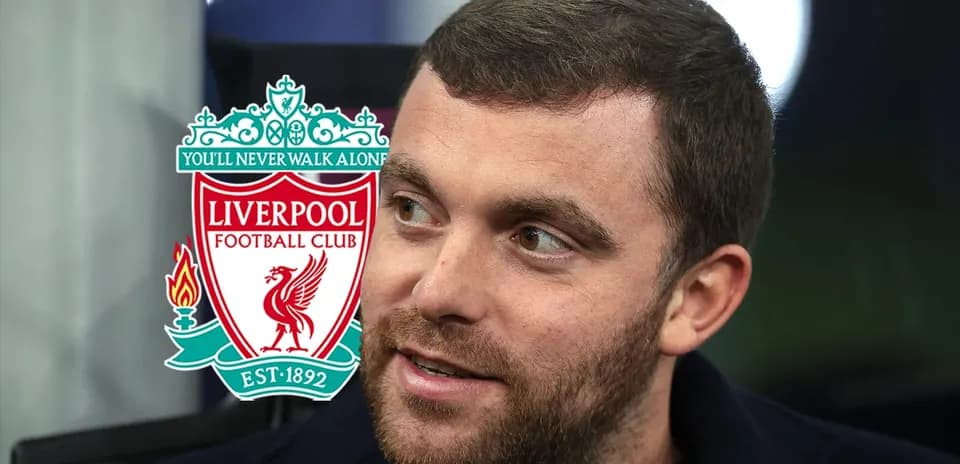Man with beard and Liverpool FC logo in background
