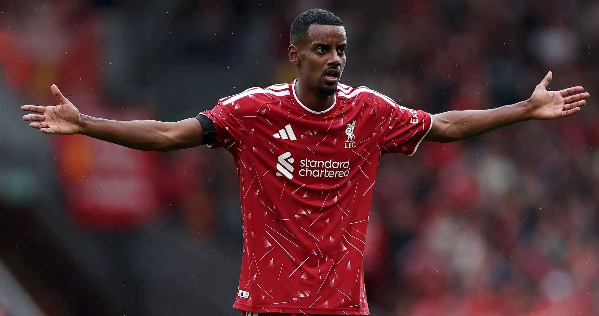 Player gesturing during a Liverpool match