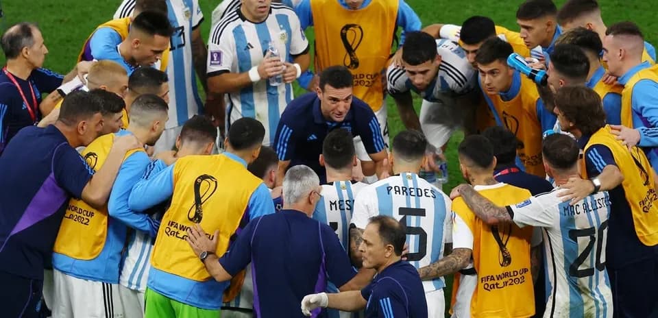Argentina team huddled during World Cup match