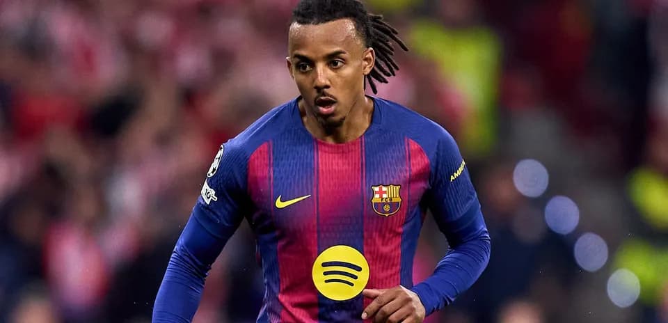 Player in FC Barcelona jersey running on field