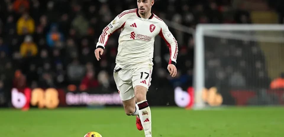 Player dribbling the ball during a football match
