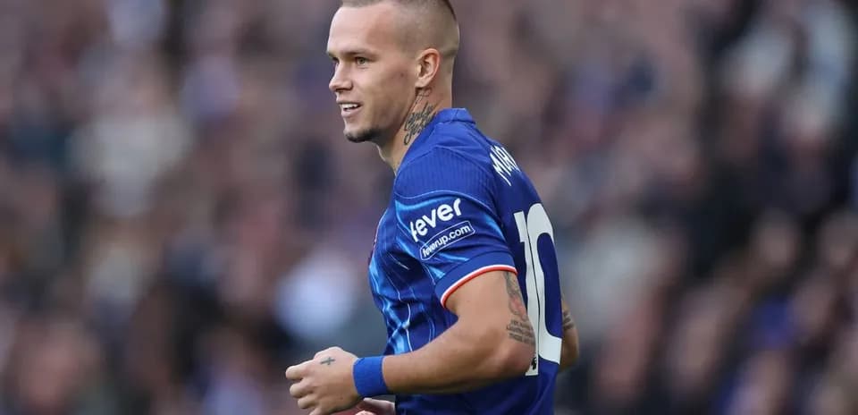 Player wearing blue jersey during match
