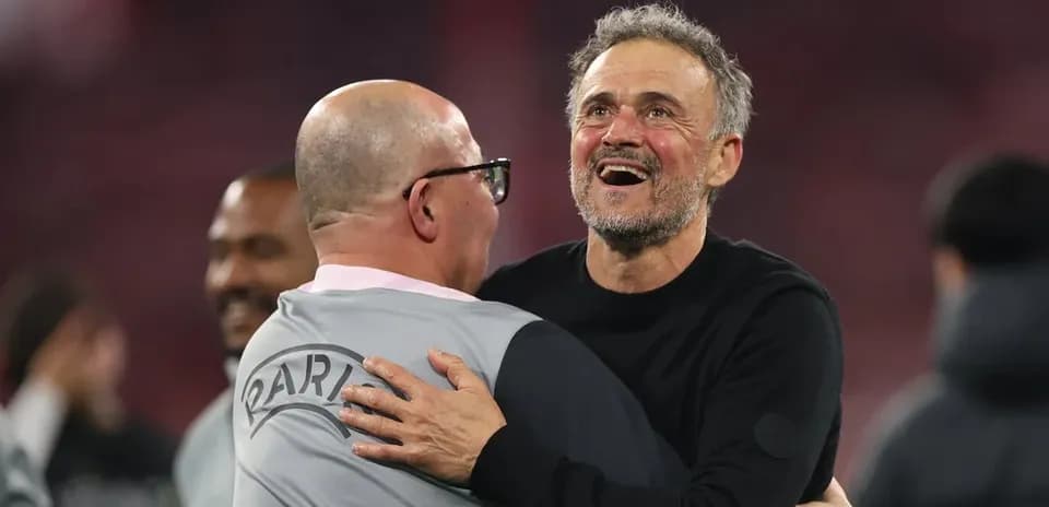 Coaches embracing after a successful match