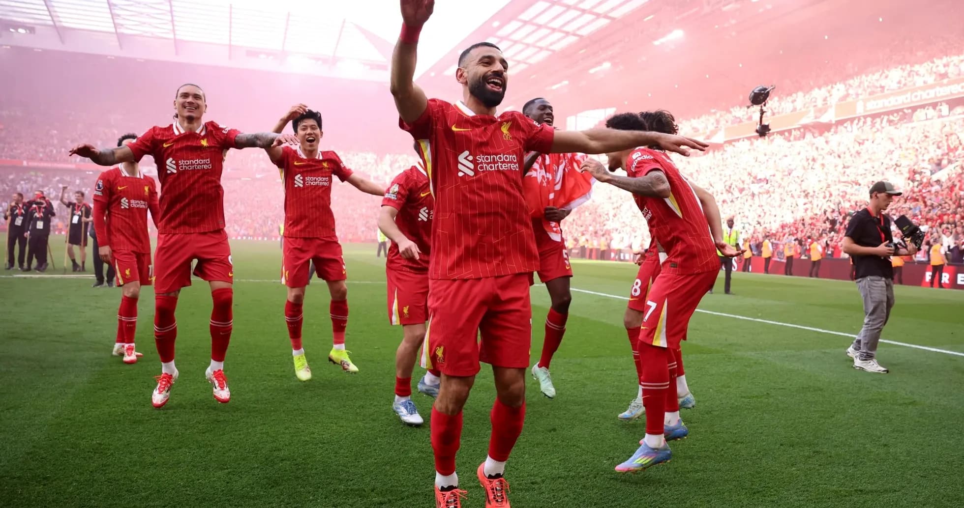 Liverpool players celebrating a goal at Anfield