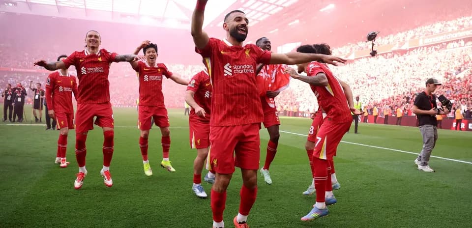 Liverpool players celebrating a goal at Anfield