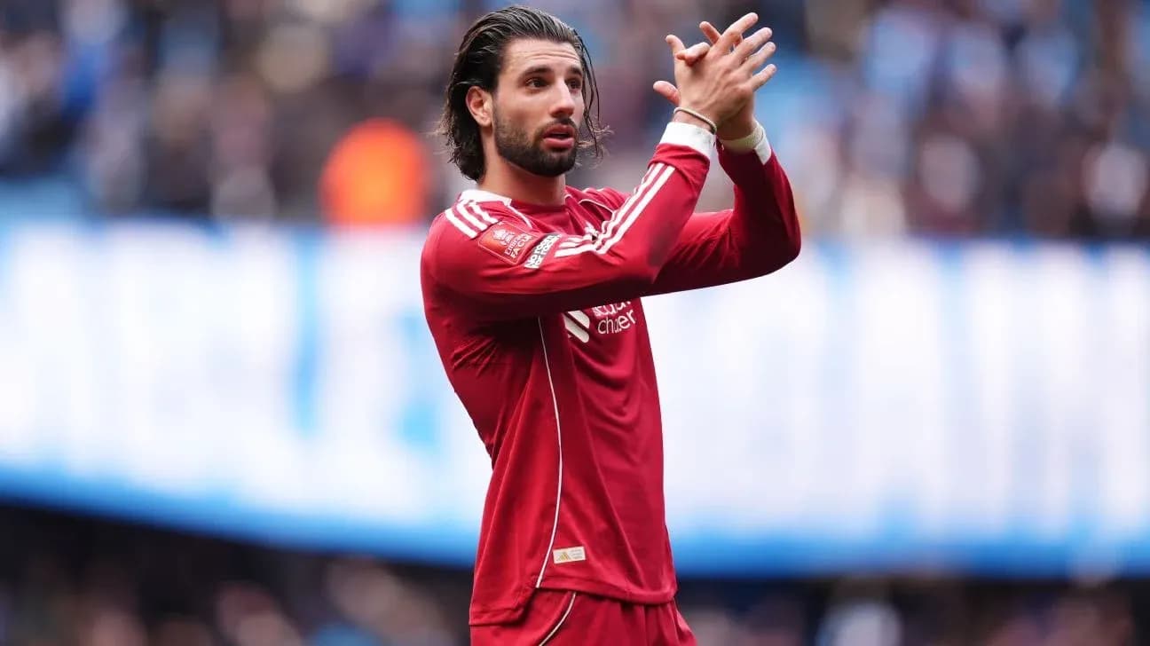 Player applauding fans during a match