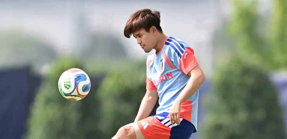 Player performing skill drill with soccer ball