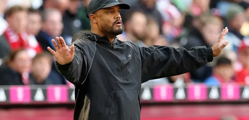 Coach gesturing from the sideline during match