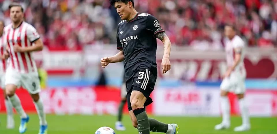 Player dribbling the ball during a soccer match