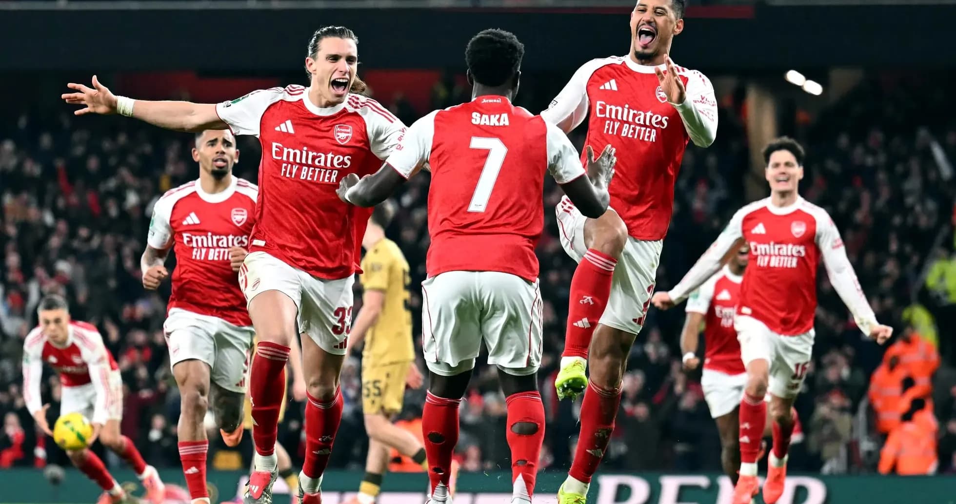 Arsenal players celebrating a goal against Crystal Palace