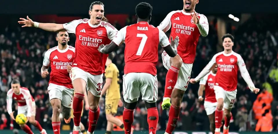 Arsenal players celebrating a goal against Crystal Palace