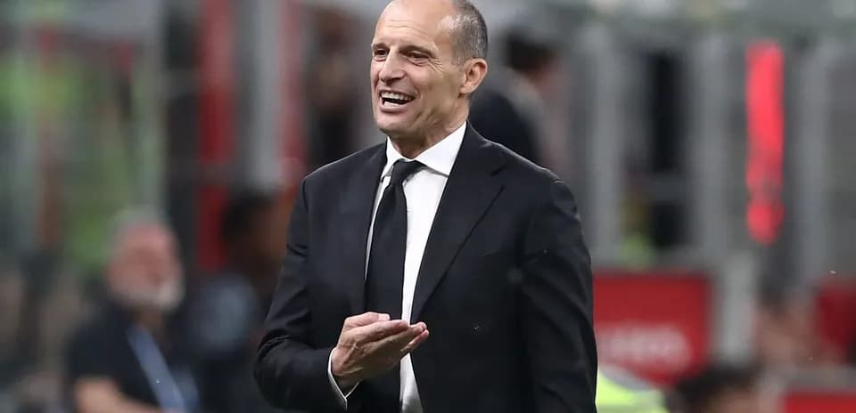 Coach gesturing on the sidelines during a match