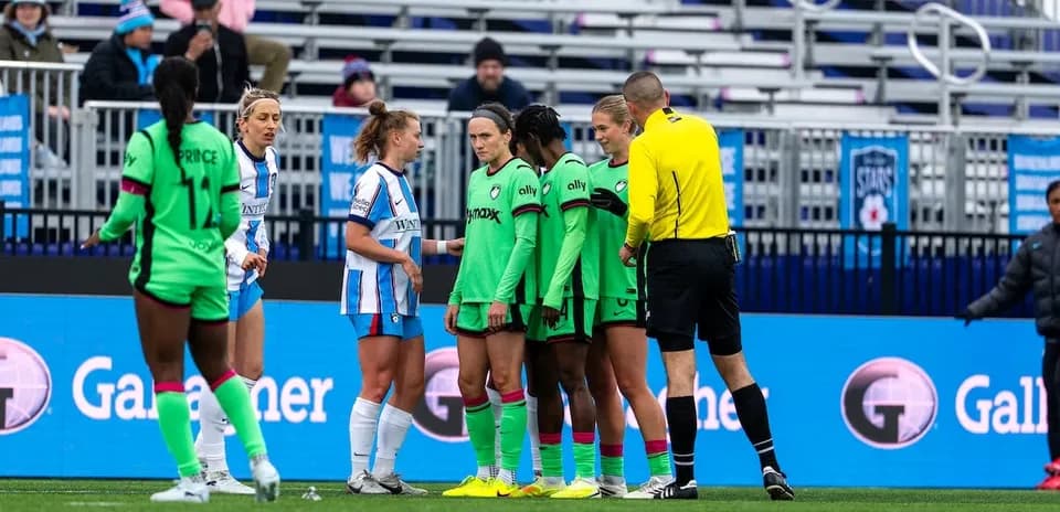 Players discussing during Chicago Red Stars match