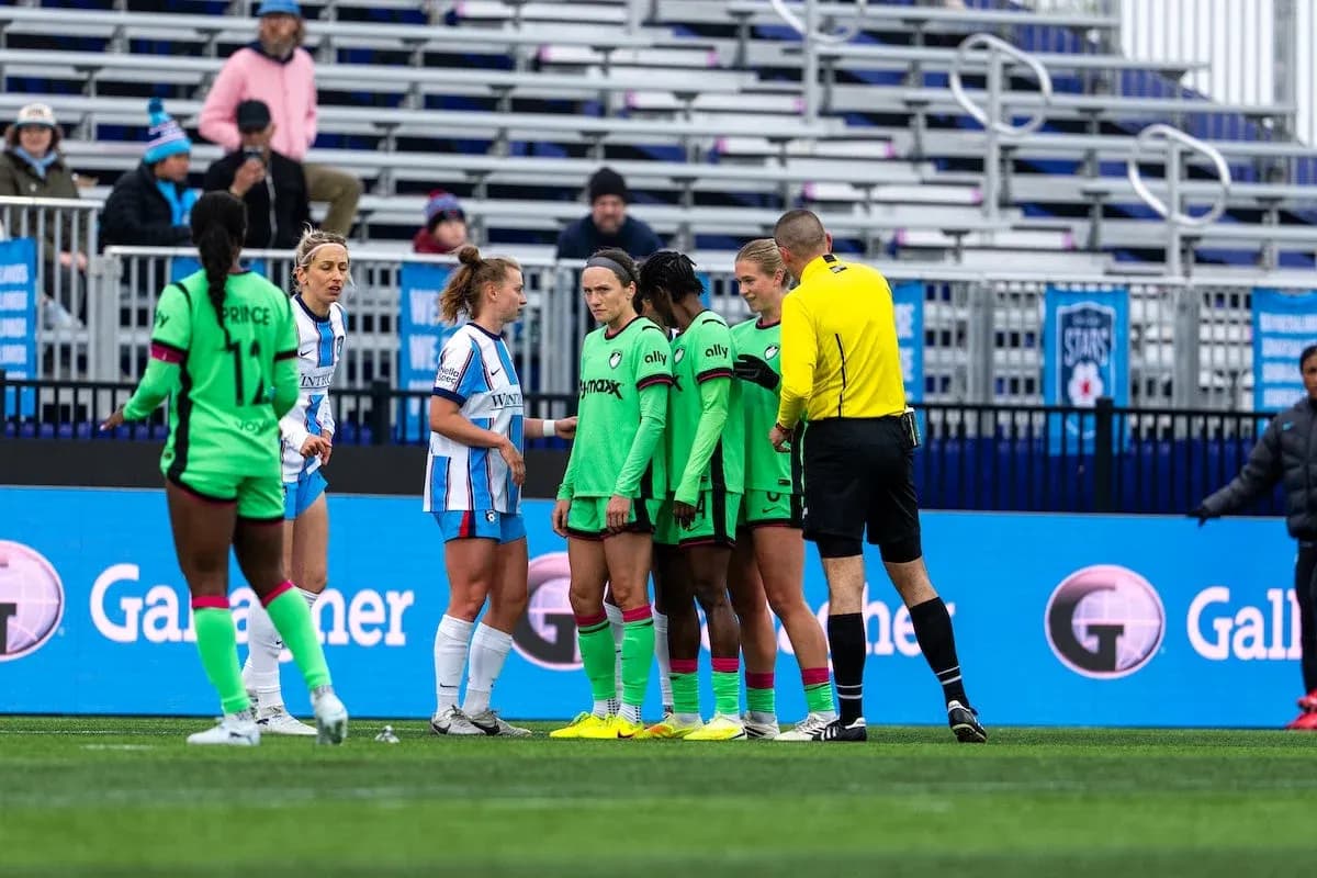 Players discussing during Chicago Red Stars match