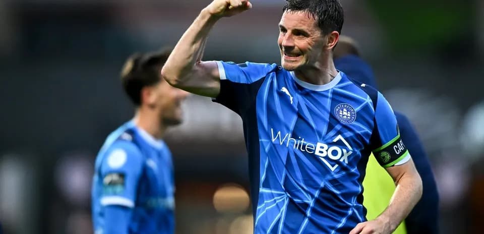 Player celebrating victory with a raised fist