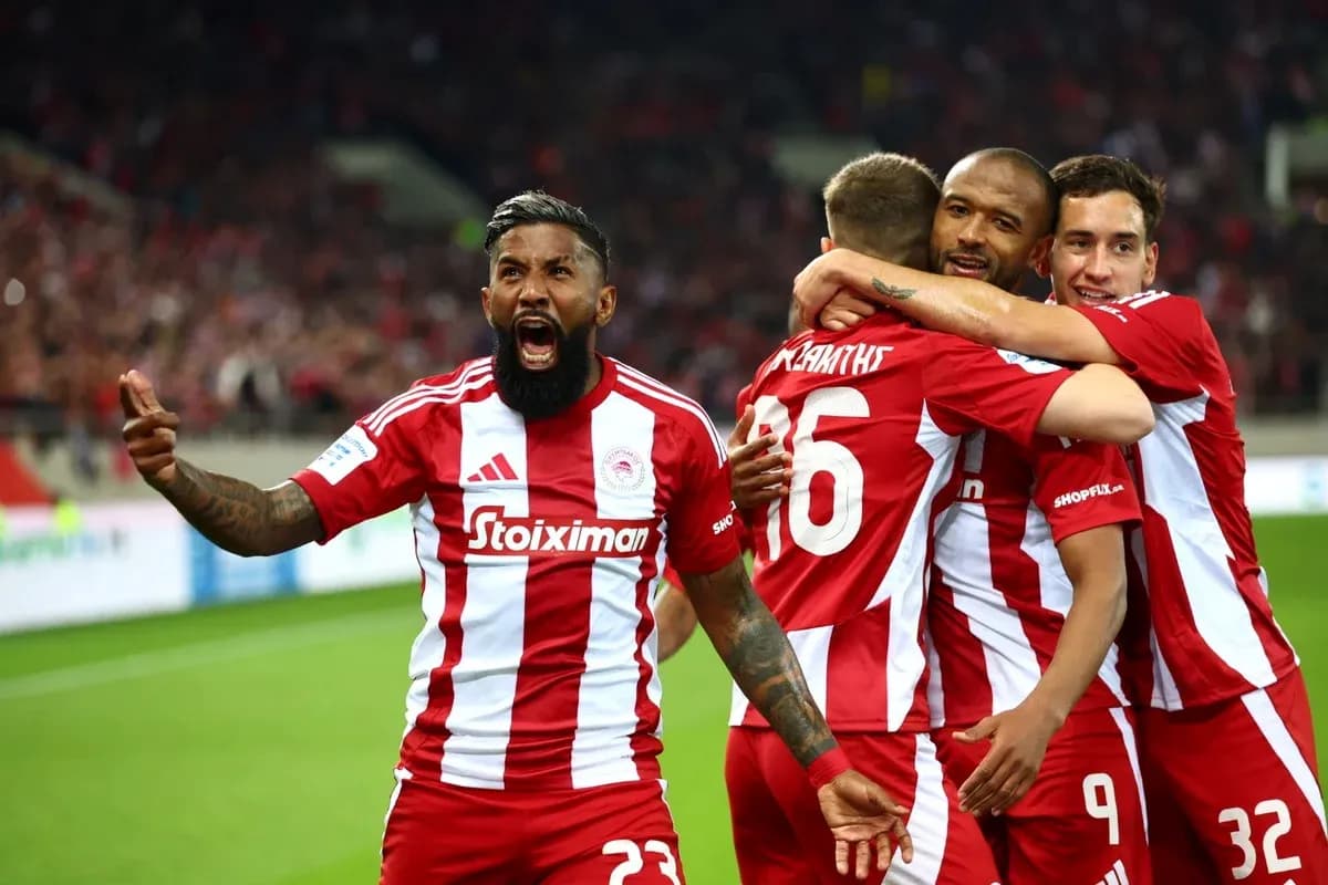 Olympiakos players celebrating a goal Olympiakos players celebrating a goal