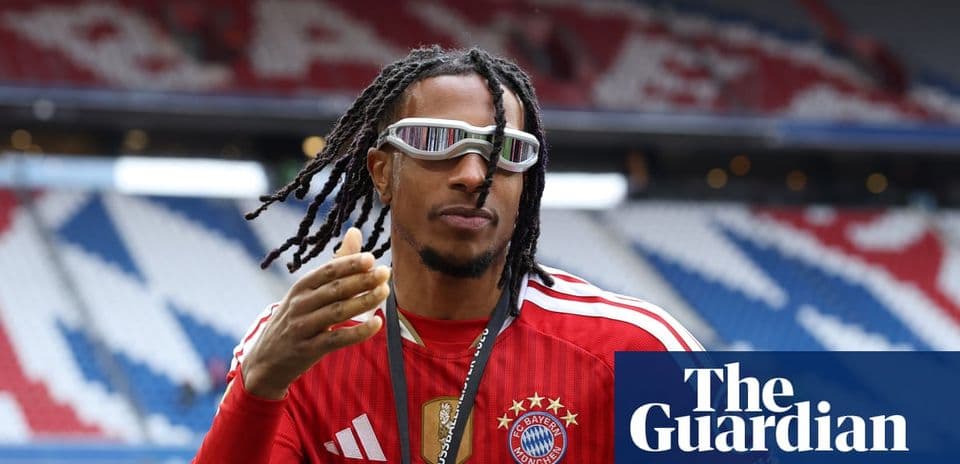 Player in Bayern Munich kit gesturing on the field