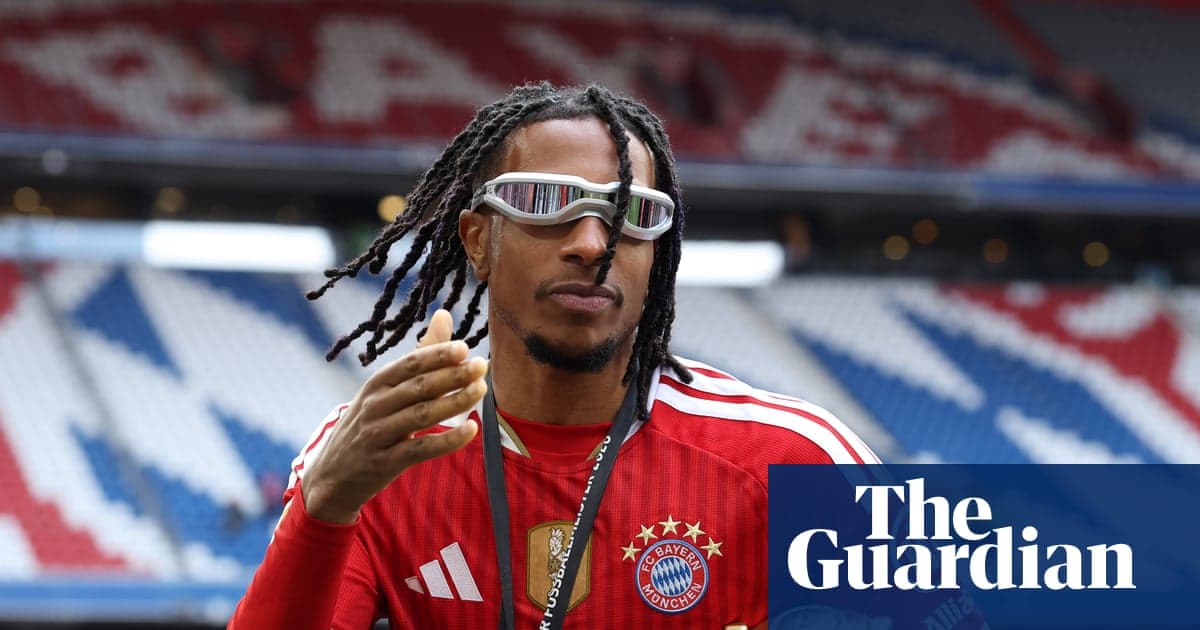 Player in Bayern Munich kit gesturing on the field
