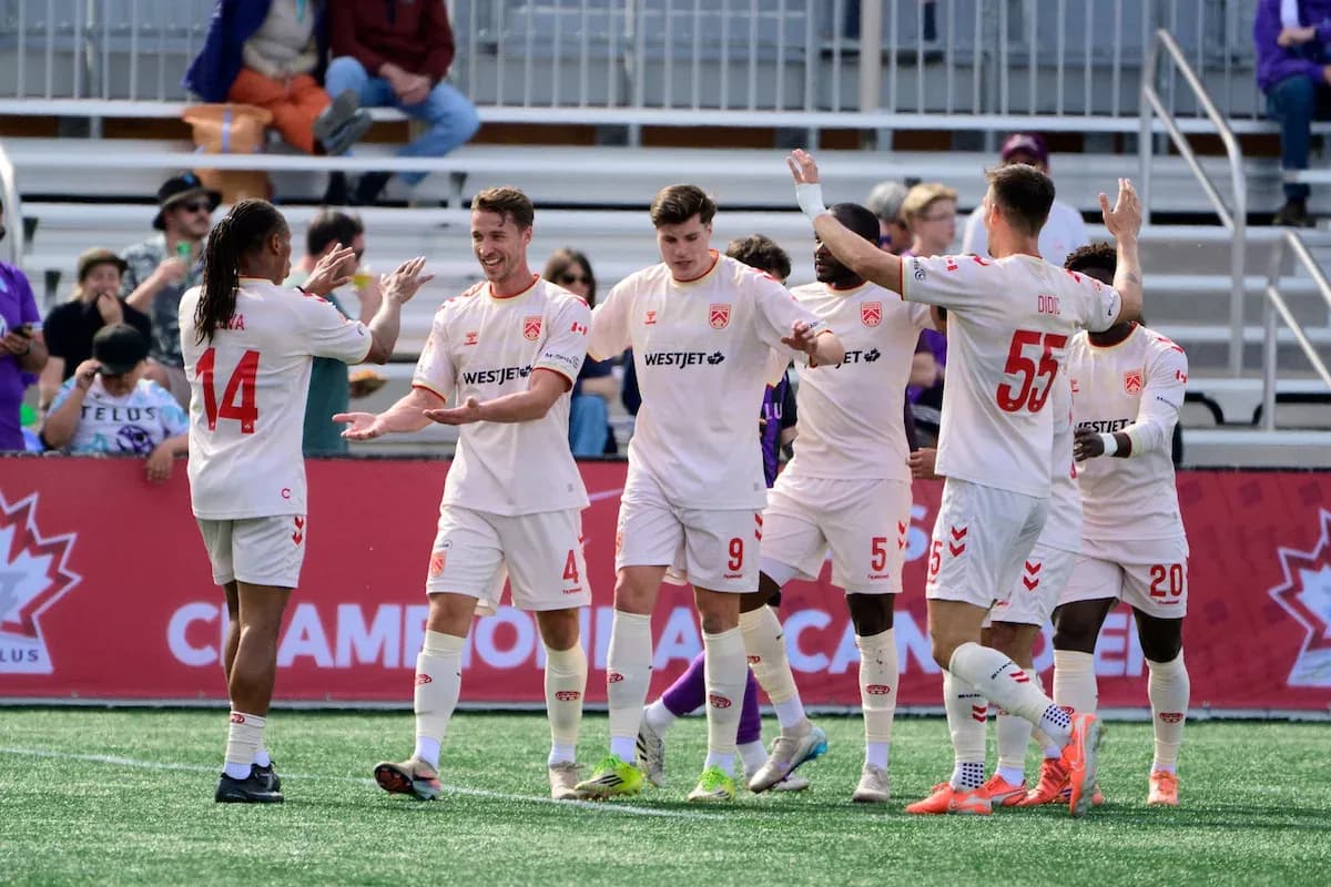 Cavalry FC players celebrating a goal