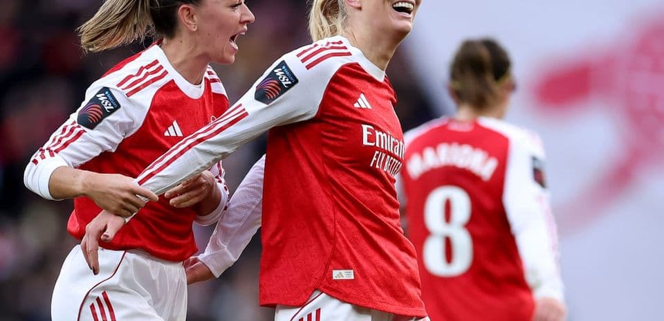 Arsenal players celebrating during FA WSL match