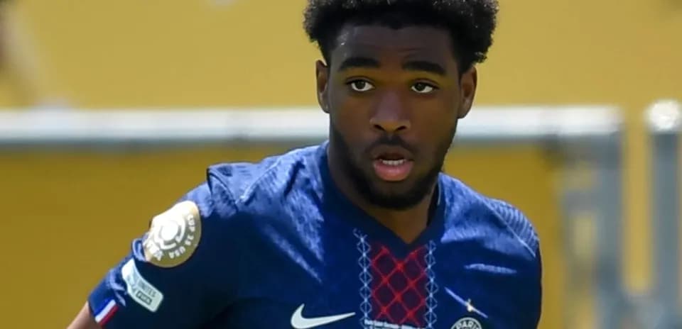 Player in Paris Saint-Germain jersey on the field