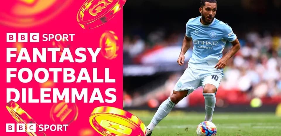 Player in light blue kit dribbling the ball