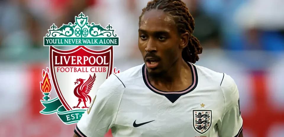 Player in England kit running with Liverpool logo background