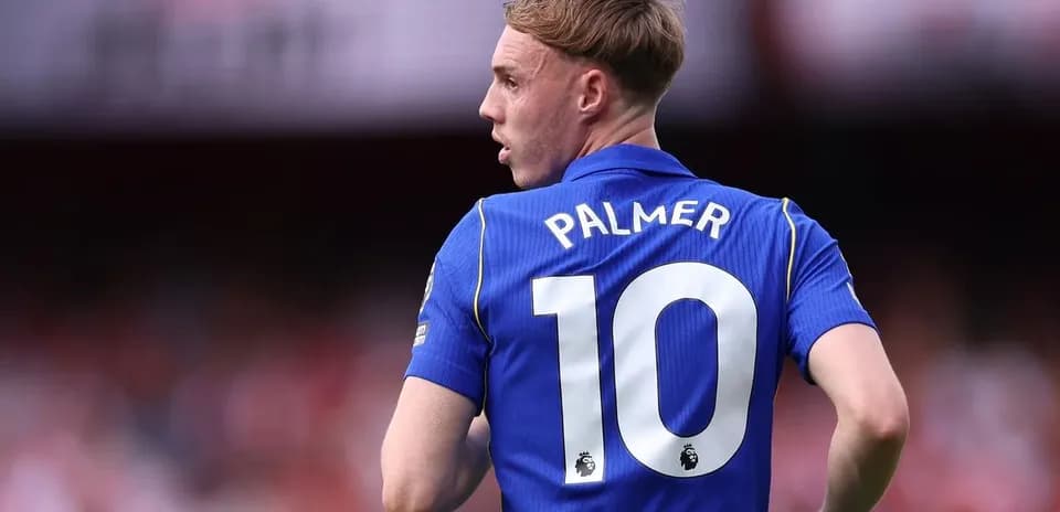 Player wearing blue jersey with number 10