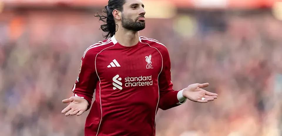 Liverpool player gesturing during a match